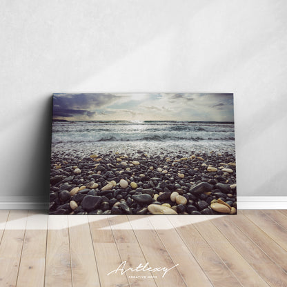 Pebble Beach with Stormy Waves Canvas Print ArtLexy   