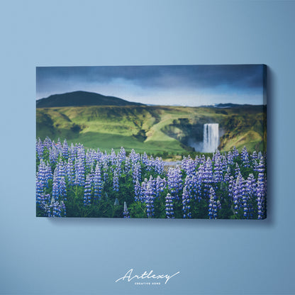 Summer view of Skogafoss Waterfall with Lupine Flowers Canvas Print ArtLexy   